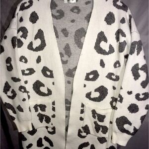 Mid length Leopard sweater size large.
